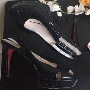 Black leather pip-toe heels red bottoms sling back